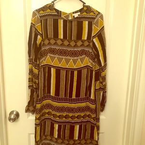 Black and yellow patterned shirt dress